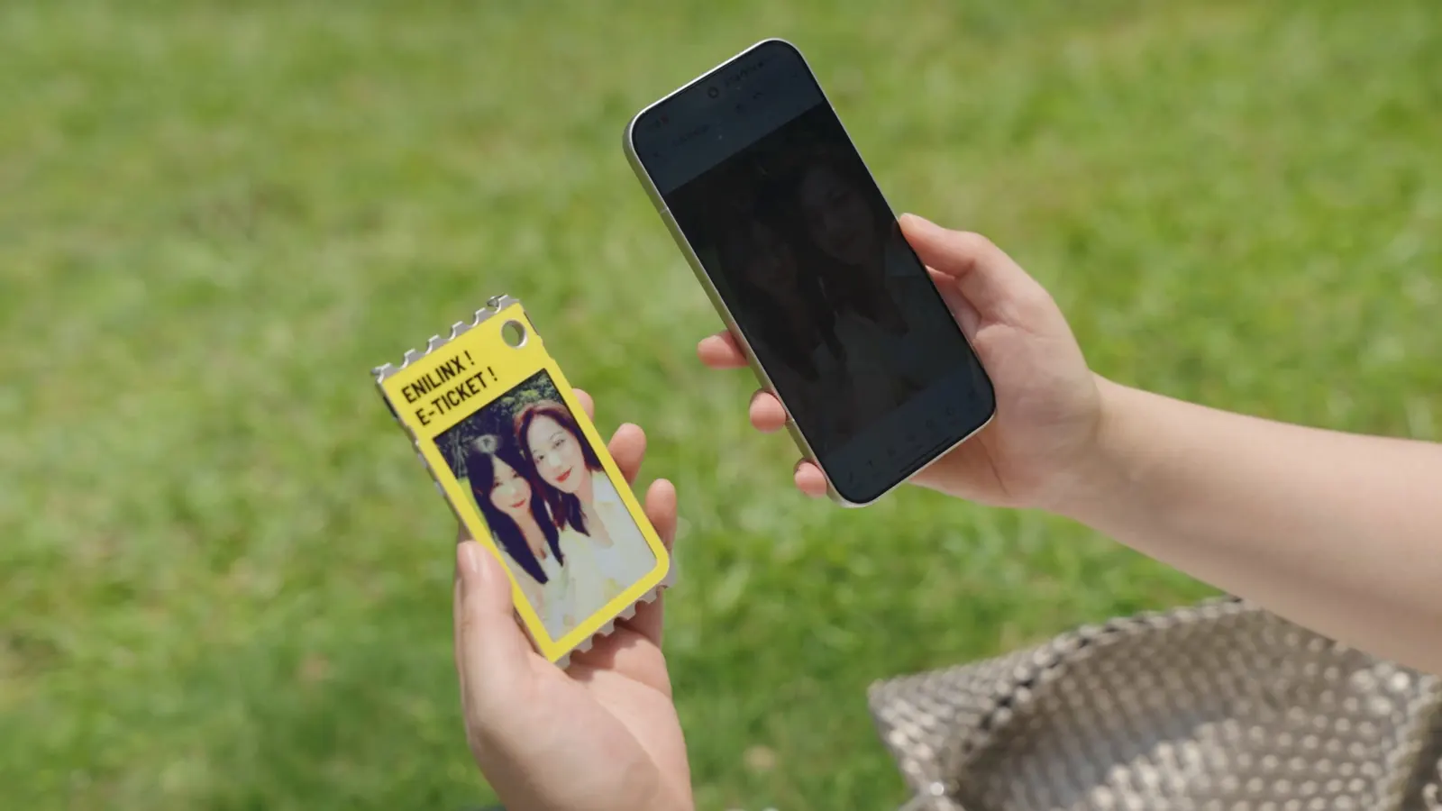 TICKEY color e-paper card being viewed outdoors in daylight